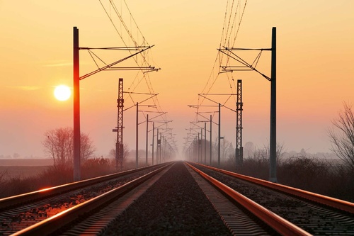 Vliesová fototapeta Železnice při západu slunce 375 x 250 cm