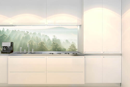 Fototapeta do kuchyně - Sluneční paprsky nad lesem 180 x 60 cm